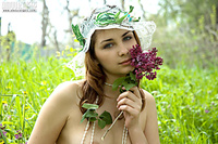 Lovely nice-looking girl pictures poses outdoors