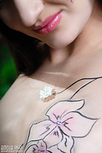 Attractive teen amour angels body art