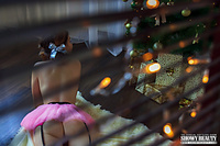 Model posing on her bed