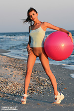 Posing on a sandy shore